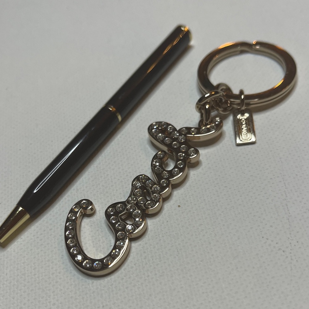 Coach Gold Rhinestone Keychain with a Black Coach Pen